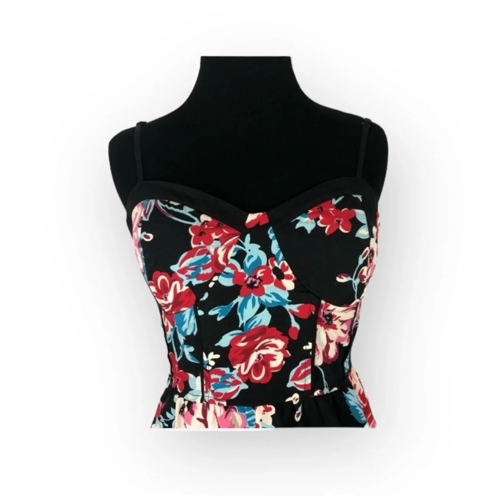 Band of Gypsies shorts romper black background with floral pattern